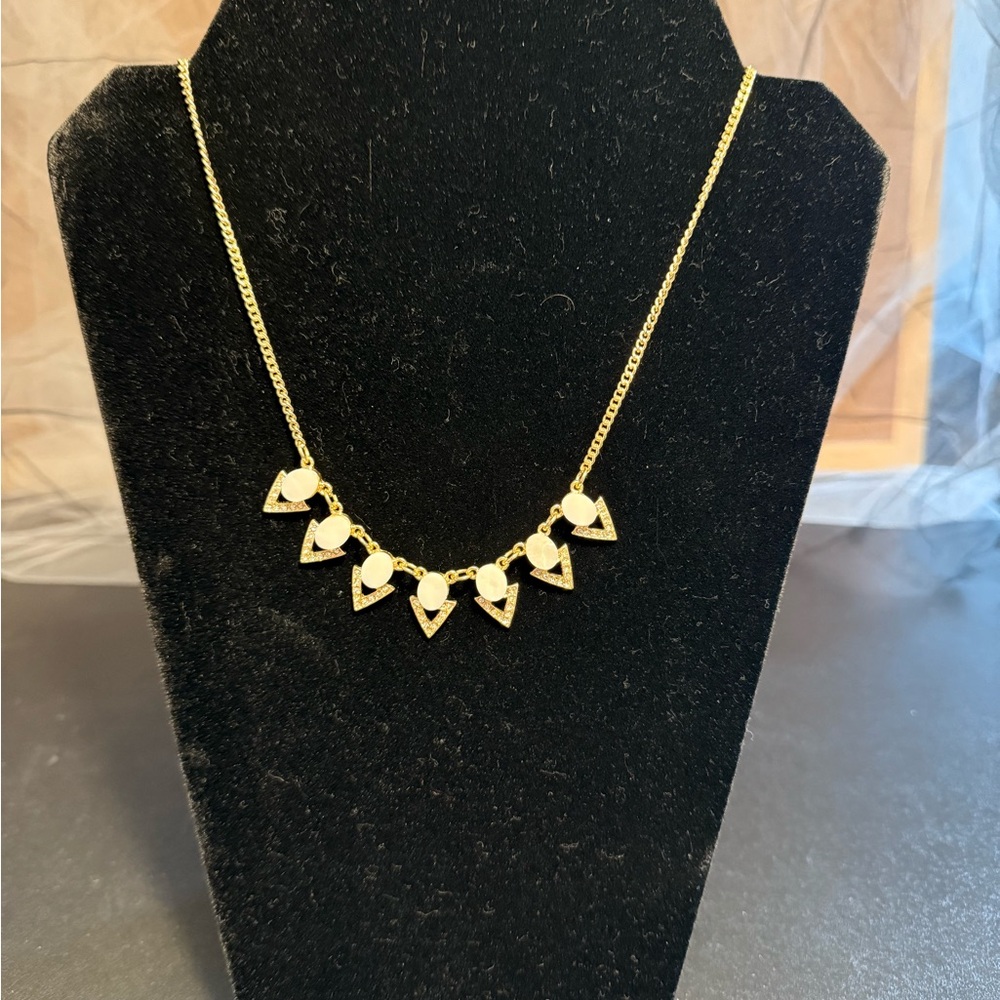 Fun Gold Necklace with white and gold geometric Accents